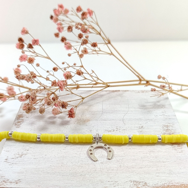 Pulsera amarilla y bolas...