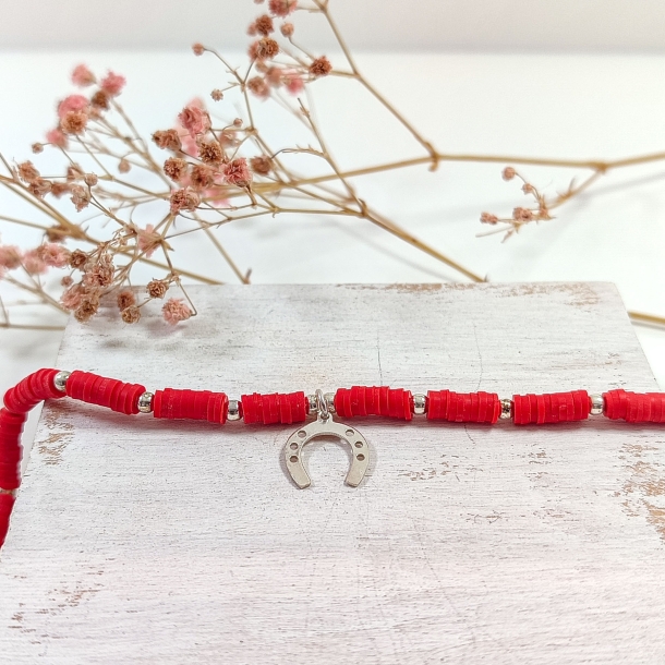 Pulsera roja y bolas...