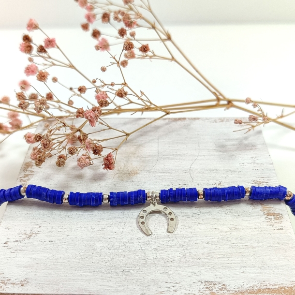 Pulsera azul eléctrico y...