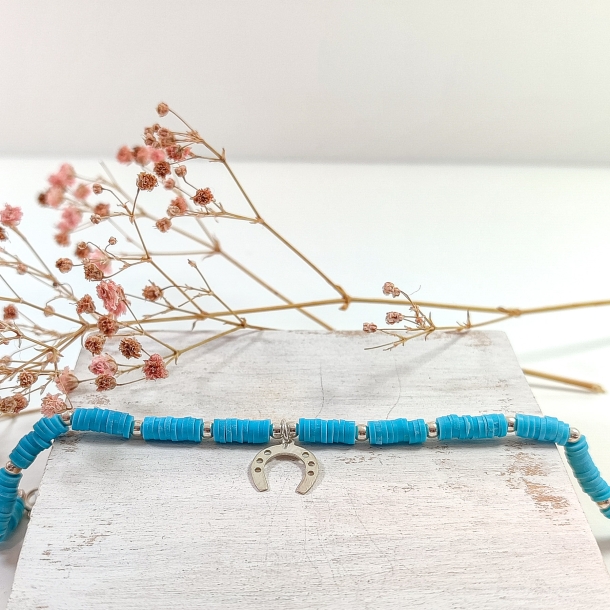 Pulsera celeste y bolas...