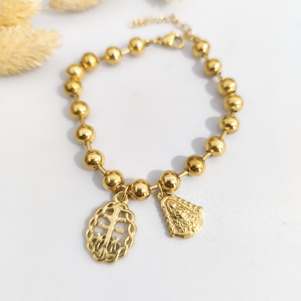 Pulsera bolitas, cruz de...