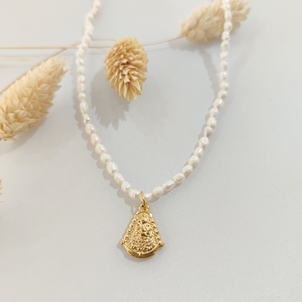 Gargantilla de perlas...