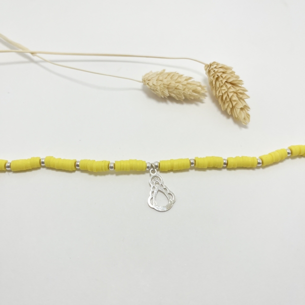 Pulsera amarilla flúor y...