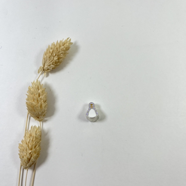 Charm silueta reina...