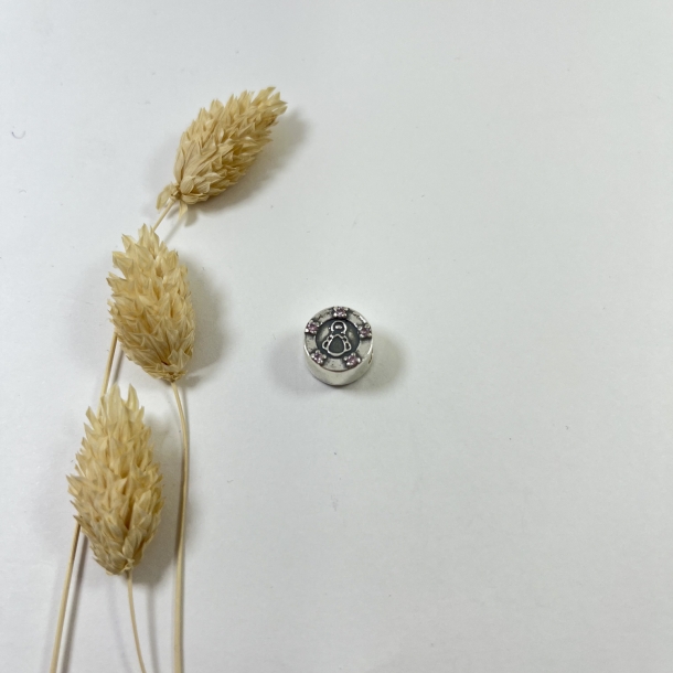 Charm silueta redondo y...