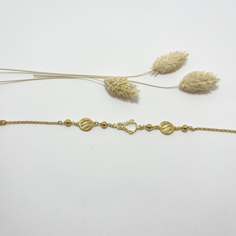 Pulsera silueta y círculo con rayas...