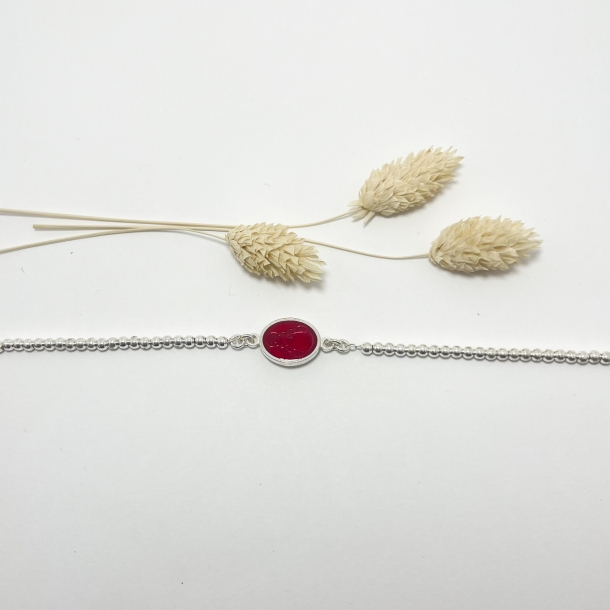 Pulsera silueta resina roja...