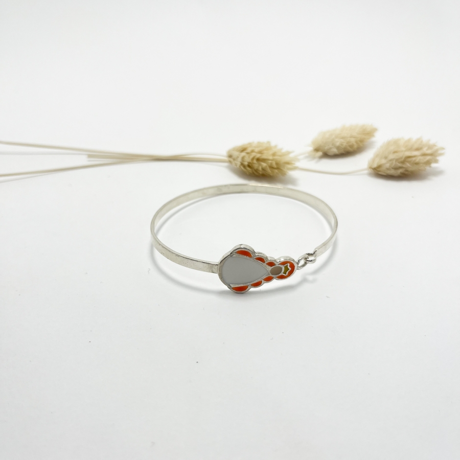 Pulsera rígida silueta naranja flúor plata