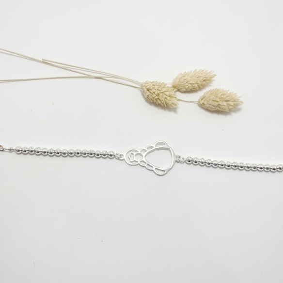 Pulsera silueta y bolas plata