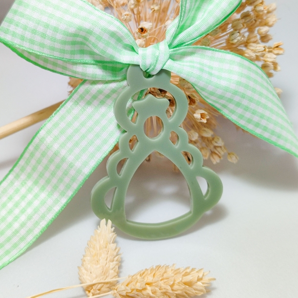 Medalla de cuna con silueta...