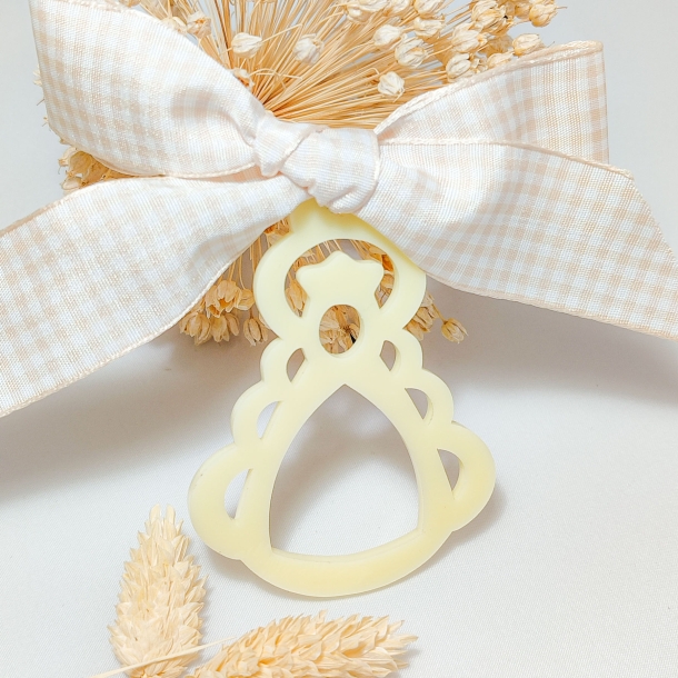 Medalla de cuna con silueta...