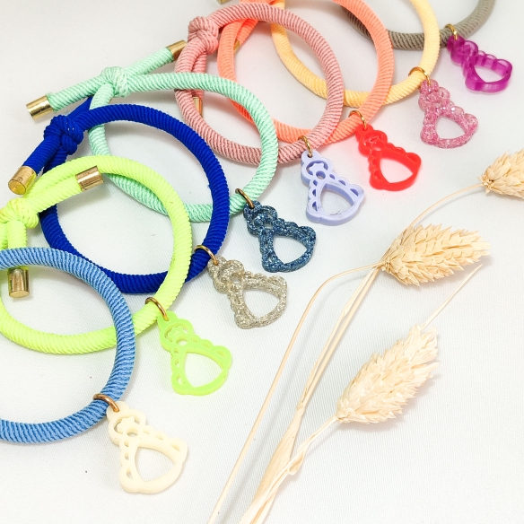 Pulsera de cuerda elástica amarilla flúor, Virgen del Rocío de acetato